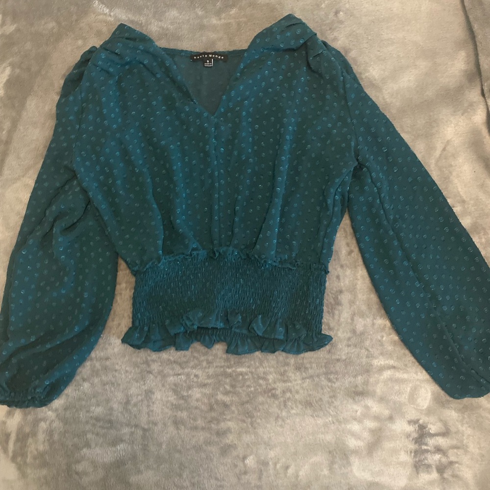 Sheer emerald green blouse. Only worn once. Price negotiable